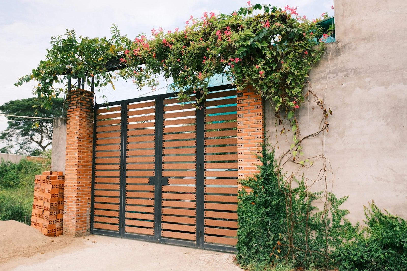 A modern gate at the entrance of a home