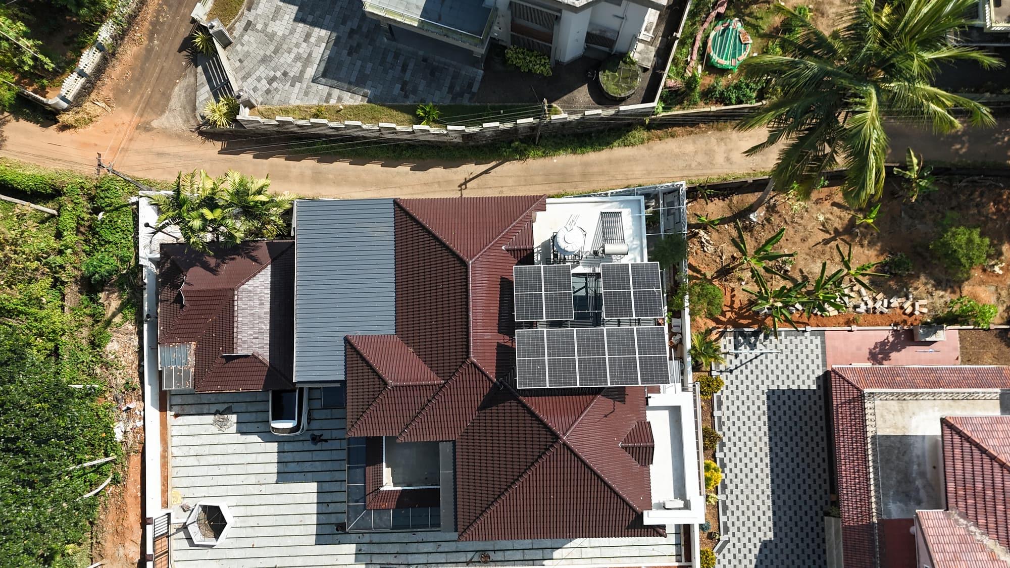 Drone view of a Kerala home with a SEDNA solar system