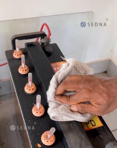 A SEDNA technician on a service visit